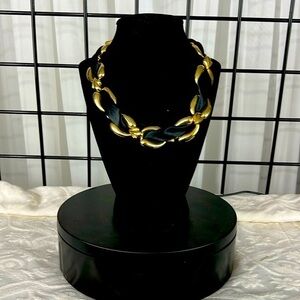 Vintage gold tone necklace intertwined with black silk ribbon